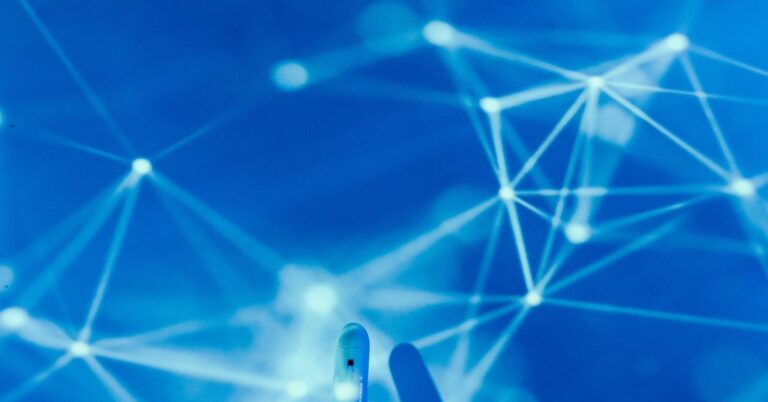 Abstract network of lit nodes and lines on a blue background, standing for the signals AI monitoring tracks